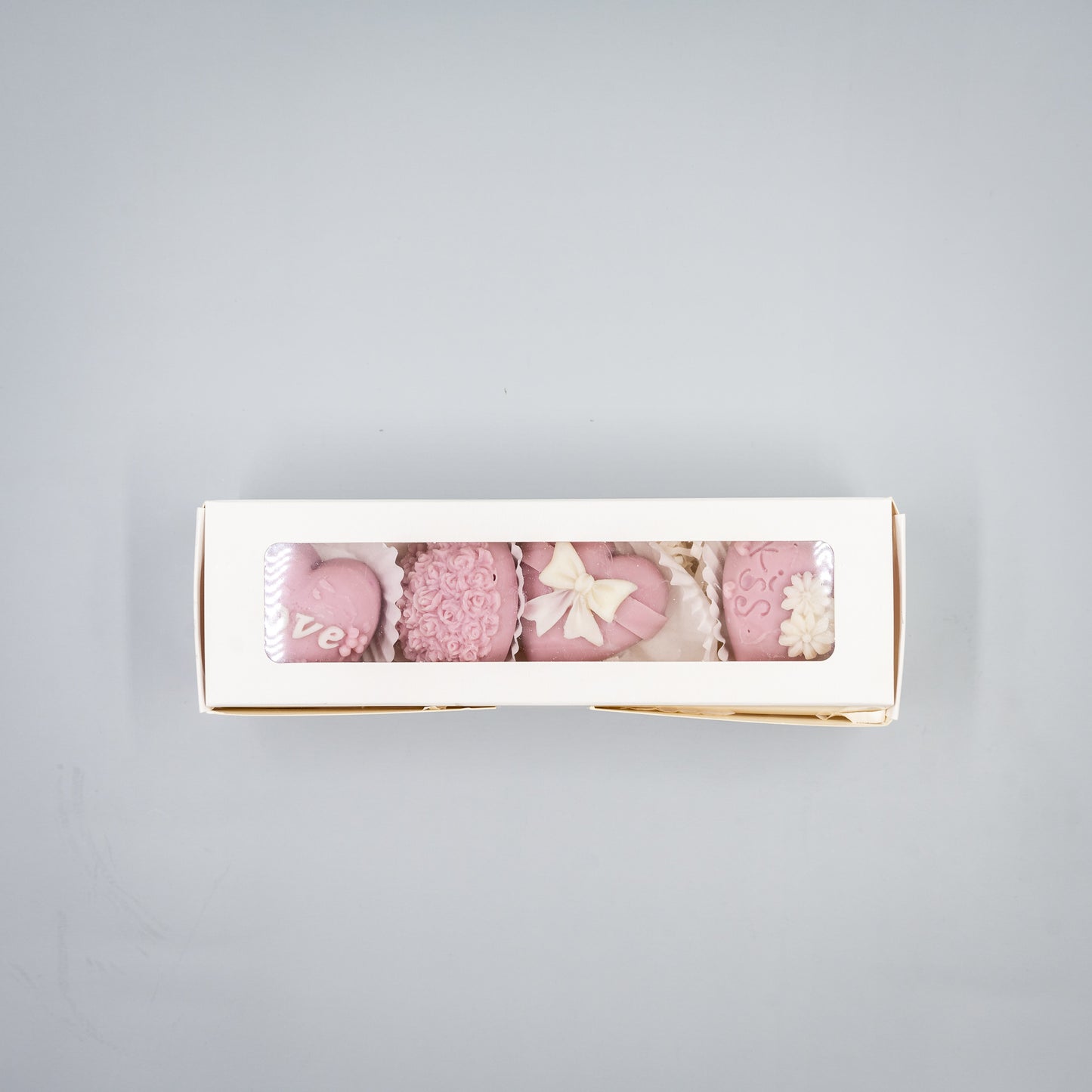 Indulge in a romantic home fragrance experience with this handcrafted collection of heart-shaped wax melts. Each set features four distinct, intricately detailed styles designed to bring elegance and charm to your space.
Four Unique Heart Styles:
Ribbon, Rose Bouque, "Kiss" with Flowers, "Love" with Ivy