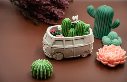 Scented Wax Melts Candle in Handmade Van/Bus-shaped Concrete Vessel with Succulent and Cactus, Double Cotton Wicks. 
Immerse yourself in this beautiful scented wax succulent and cactus garden thoughtfully crafted in the handmade van/bus-shaped candle vessel. A perfect decorative piece for any room, or a gift for plant lovers, housewarming, or any special occasions.