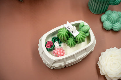Scented Wax Melts Candle in Handmade Van/Bus-shaped Concrete Vessel with Succulent and Cactus, Double Cotton Wicks. 
Immerse yourself in this beautiful scented wax succulent and cactus garden thoughtfully crafted in the handmade van/bus-shaped candle vessel. A perfect decorative piece for any room, or a gift for plant lovers, housewarming, or any special occasions.