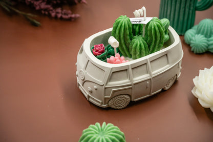 Scented Wax Melts Candle in Handmade Van/Bus-shaped Concrete Vessel with Succulent and Cactus, Double Cotton Wicks. 
Immerse yourself in this beautiful scented wax succulent and cactus garden thoughtfully crafted in the handmade van/bus-shaped candle vessel. A perfect decorative piece for any room, or a gift for plant lovers, housewarming, or any special occasions.