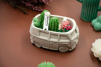 Scented Wax Melts Candle in Handmade Van/Bus-shaped Concrete Vessel with Succulent and Cactus, Double Cotton Wicks. 
Immerse yourself in this beautiful scented wax succulent and cactus garden thoughtfully crafted in the handmade van/bus-shaped candle vessel. A perfect decorative piece for any room, or a gift for plant lovers, housewarming, or any special occasions.