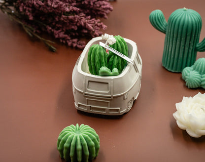 Scented Wax Melts Candle in Handmade Van/Bus-shaped Concrete Vessel with Succulent and Cactus, Double Cotton Wicks. 
Immerse yourself in this beautiful scented wax succulent and cactus garden thoughtfully crafted in the handmade van/bus-shaped candle vessel. A perfect decorative piece for any room, or a gift for plant lovers, housewarming, or any special occasions.